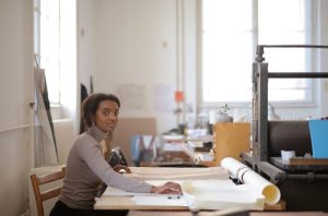 woman with printing machine